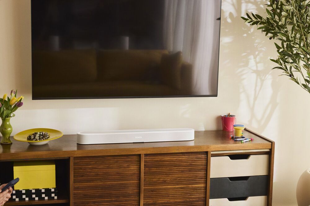 Living room media console with a TV and Sonos soundbar